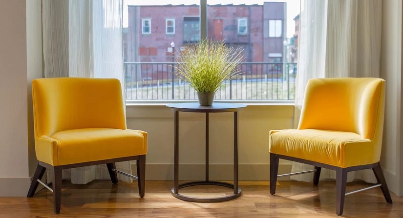 Yellow chairs by a window